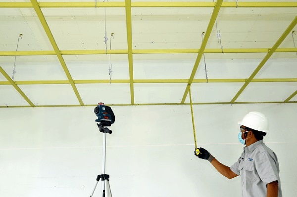 Construction of plaster ceilings, painting and tiling